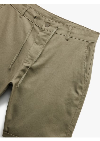 Keten Pamuk Karışımlı Katlamalı Paça Cep Detaylı Beli Bağcıklı Düğmeli Şort modelleri