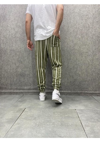 Bel ve Paça Lastikli Çizgili Pantolon modelleri