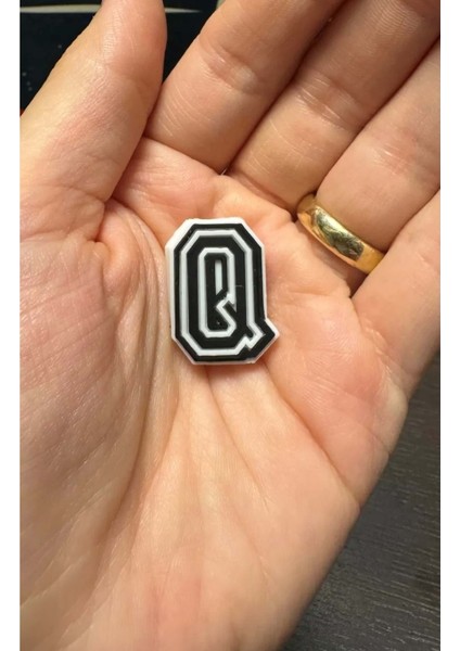 Terlik Süsü/siyah Q Harfi