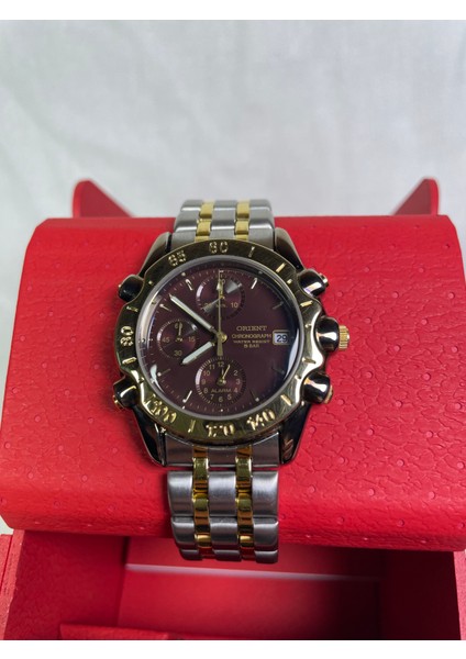 BS902025118A Retro Model Yuvarlak Metalik Kasa Sarı Çerçeveli Üç Fonksiyonlu Takvimli Kahverengi Kadranlı Kronometre ve Alarmlı Erkek Kol Saati