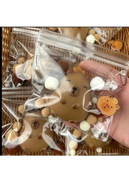 Capybara Squishy Oyuncak Taba Sukuşi Kapibara (Rozet Hediyeli) Sıkma Oyuncağı, Uzayan Stress