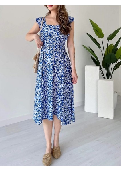 Sırtı Gipeli Omuzu Fırfırlı Elbise indirimleri