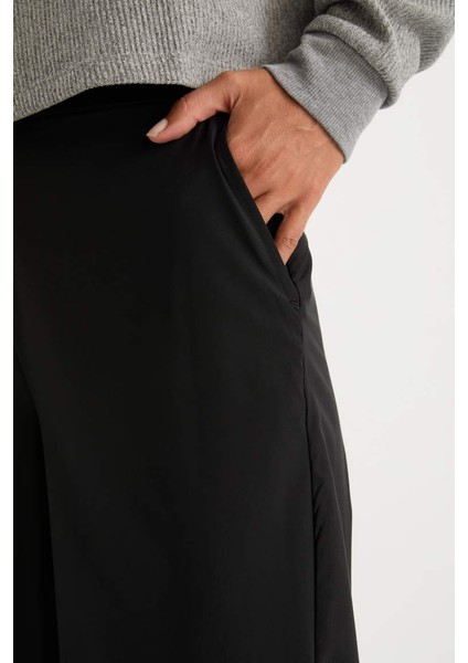 Yeni Sezon Defactofit Wide Leg Geniş Paça Cepli Sporcu Dokuma Pantolon indirimleri