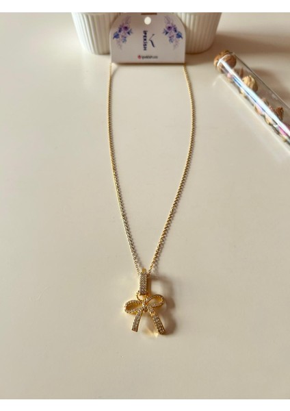 Gold Renk Fiyonk Figürlü Kadın Kolye – Zirkon Taşlı, Paslanmaz Çelik, 48 cm Zincir modelleri