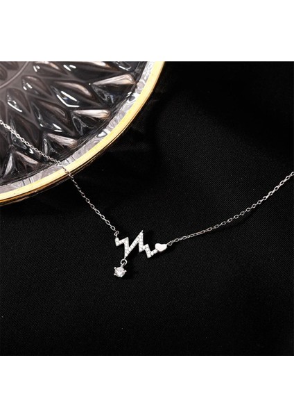 Kalp Ritmi Kalp Atışı Figürlü Zirkon Taşlı Rodyum Kaplı Şık Tasarım Kolye