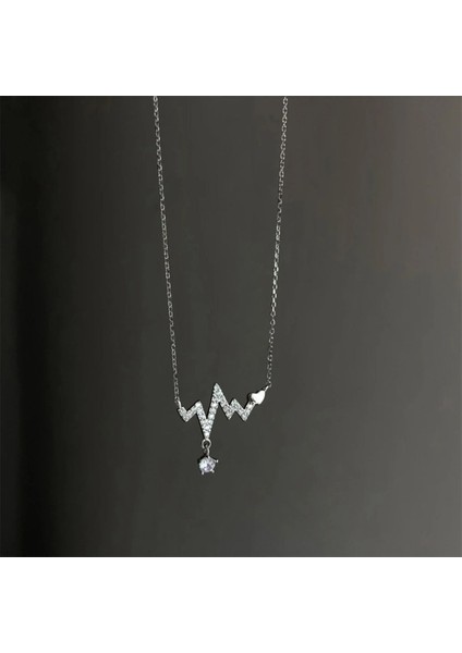 Kalp Ritmi Kalp Atışı Figürlü Zirkon Taşlı Rodyum Kaplı Şık Tasarım Kolye fırsatları