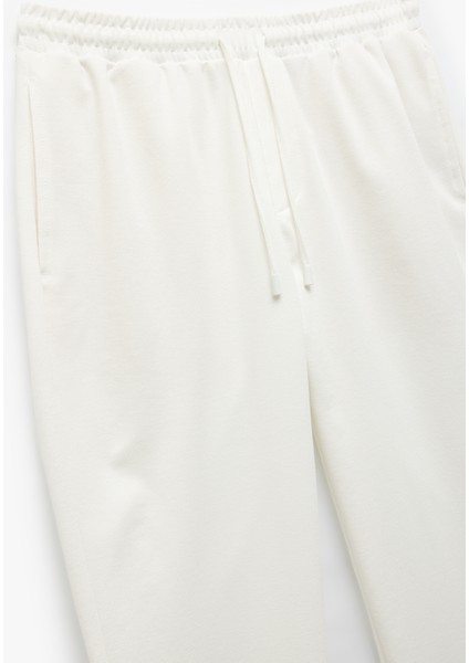 Katlamalı Paça Cep Detaylı Beli Bağcıklı Eşofman Pantolon indirimleri