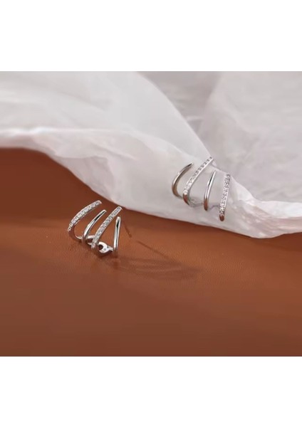 Kadınlar Için Zirkon Taşlı Gümüş Renkli Tasarım Pençe Model Küpe modelleri