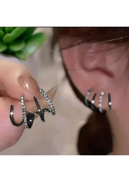 Kadınlar Için Zirkon Taşlı Gümüş Renkli Tasarım Pençe Model Küpe indirimleri