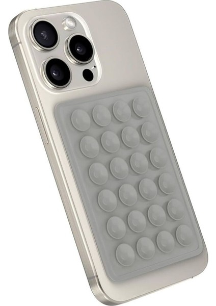 Gri silikon telefon tutucu, güçlü yapışkan ve vantuzlu tasarım, dayanıklı kullanım sağlar