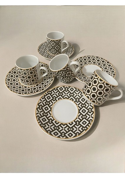 Modern desenli 4 kişilik beyaz ve altın detaylı porselen kahve fincan seti indirimleri