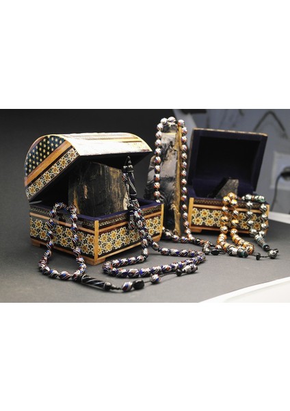 Oltu Taşı ve Galalith Kapsül Kesim Çift Çeşmi Işlemeli Tespih fiyatları