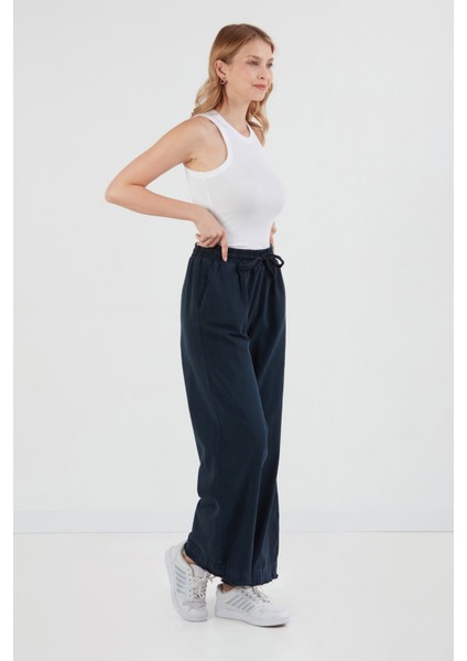 Paçası Püsküllü Beli Lastikli Gabardin Pantolon fırsatları