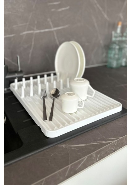 Şık ve kullanışlı beyaz bulaşıklık, mutfağınıza zarafet katacak. indirimleri