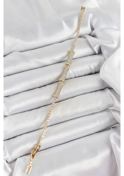 Pirinç Gold Renk Zirkon Taşlı Kemik Model Kadın Bileklik - Bamido