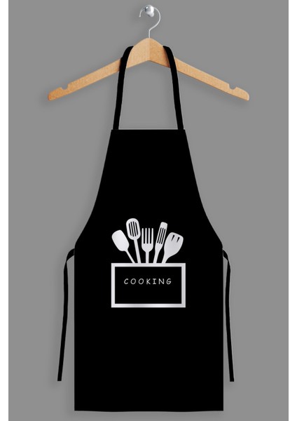 Şık ve kullanışlı siyah mutfak önlüğü, yemeklerde stilinizi tamamlar.