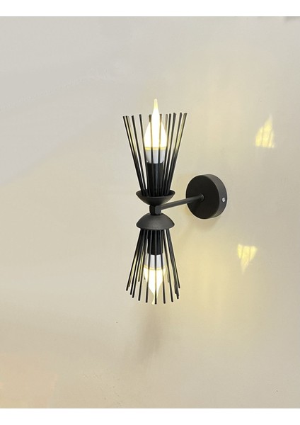 Şık Siyah Metal E14 Duylu Duvar Aplik, özel tasarım ampul ile tamamlanmıştır