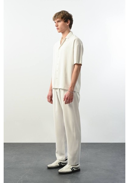 Beyaz Dökümlü Kumaş Erkek Pantolon modelleri