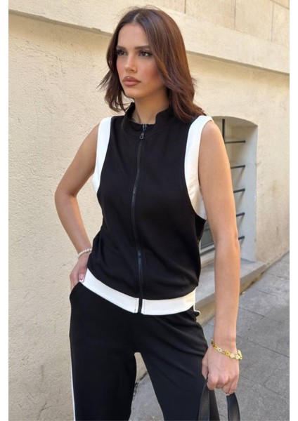 Kadın Kolsuz Şerit Detaylı Fermuarlı Kısa Yelek Geniş Paça Pantolon Ikili Spor Takım modelleri