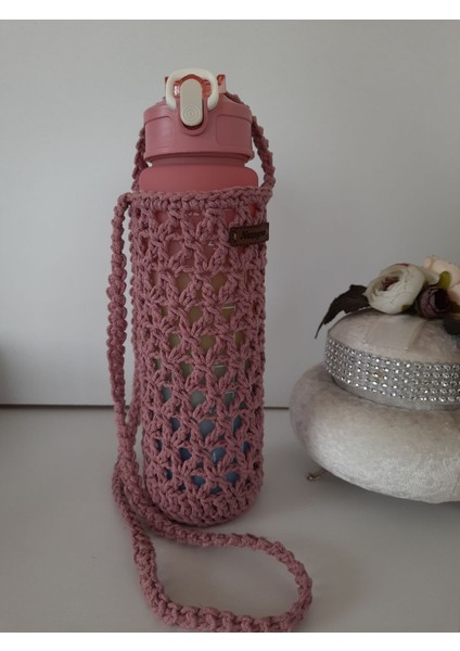 Pembe renkli spor matara ve taşıma çantası, şık ve pratik kullanım sağlar. modelleri