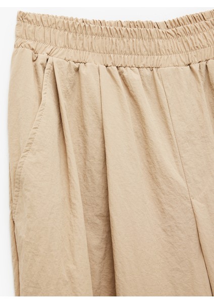 Rahat Kalıp Beli Lastikli Cepli Pileli Paraşüt Pantolon modelleri