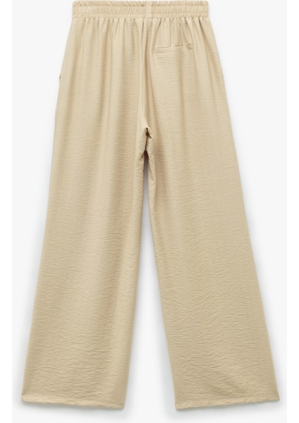 Yeni Sezon Viskon Kumaş Beli Lastikli Cepli Düz Geniş Paça Pantolon