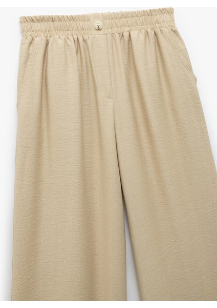 Yeni Sezon Viskon Kumaş Beli Lastikli Cepli Düz Geniş Paça Pantolon