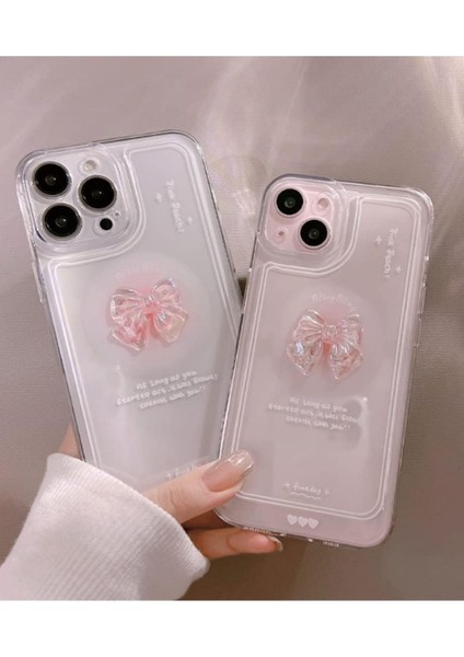 Apple iPhone 15 Uyumlu Kılıf '3 Boyutlu Kurdele' Kamera Korumalı Yumuşak Kapak Şeffaf indirimleri