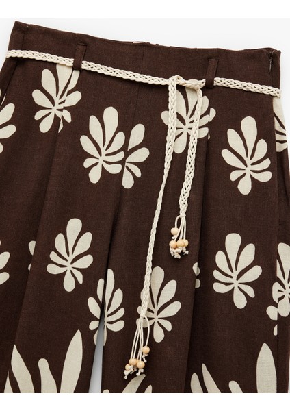 Yeni Sezon Keten Karışımlı Kemer Detaylı Cepli Geniş Paça Çiçekli Palazzo Pantolon modelleri
