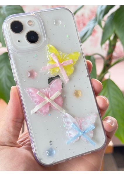 Apple iPhone 13 - 14 - 15 Kılıf Şeffaf Simli Renkli 3D Kelebek Desenli Fiyonk Kurdale Silikon Kapak fırsatları