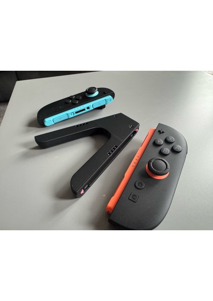 Nintendo Switch 2 Uyumlu Joy-Con Mekanik Tutucu – Kilitli Ergonomik Aparat (3’lü Set)