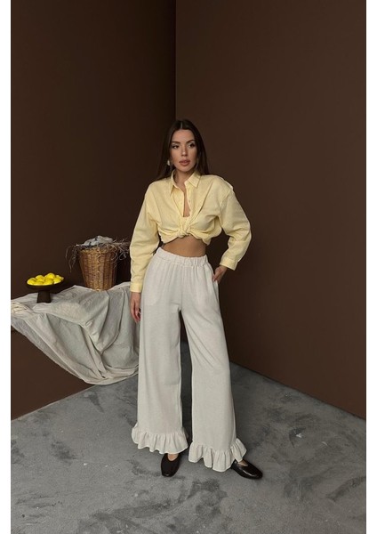 Bej Paçası Fırfırlı Keten Pantolon fiyatları