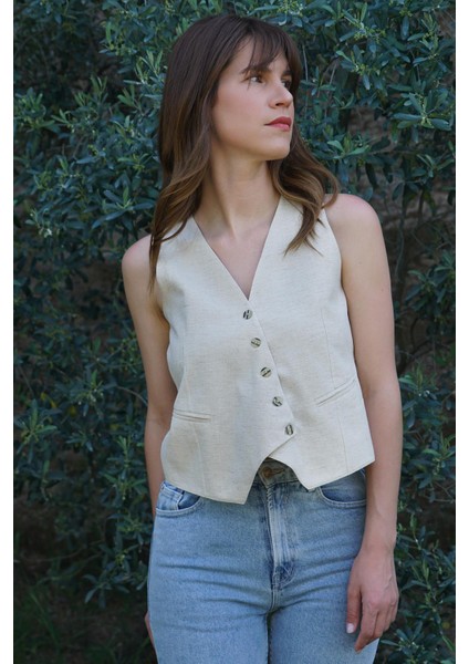 Doğal Dokulu Keten-Pamuk Yelek – Asimetrik Düğme ve Arka Bağlama Detaylı fiyatları