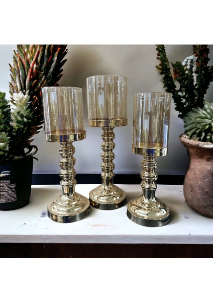 Altın Tonlarında Şık Mumluk, Evinizde Sıcaklık ve Zarafet Sağlar. modelleri