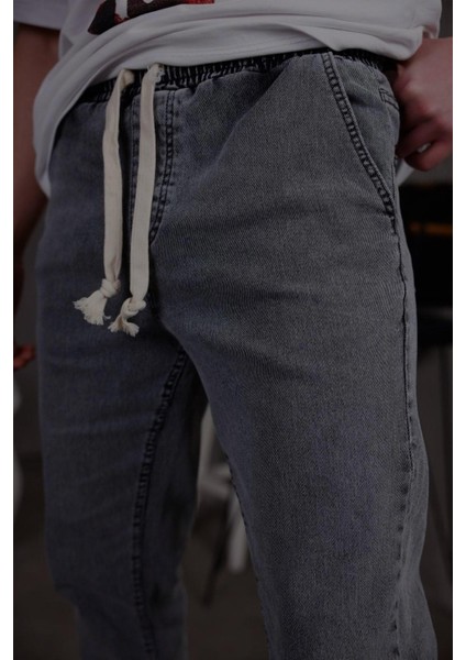 Zessi Paçası ve Beli Lastikli Slim Fit Likralı Kot Jogger Pantolon fiyatları