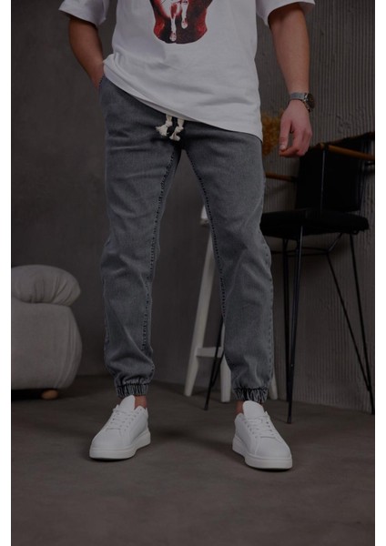 Zessi Paçası ve Beli Lastikli Slim Fit Likralı Kot Jogger Pantolon indirimleri