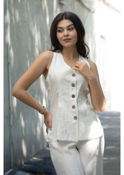 Balık Sırtı Yelek ve Beli Arkadan Lastikli Pensli Bol Paça Pantolon 1246 fiyatları