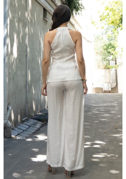 Balık Sırtı Yelek ve Beli Arkadan Lastikli Pensli Bol Paça Pantolon 1246 fırsatları