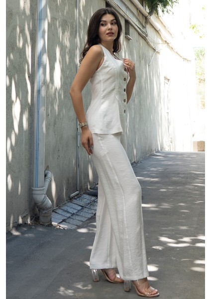 Balık Sırtı Yelek ve Beli Arkadan Lastikli Pensli Bol Paça Pantolon 1246 indirimleri