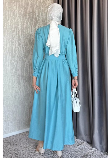 Bebe Yaka Ön Düğme Detaylı Pileli Kuşaklı Tesettür Elbise P-00017560 fırsatları