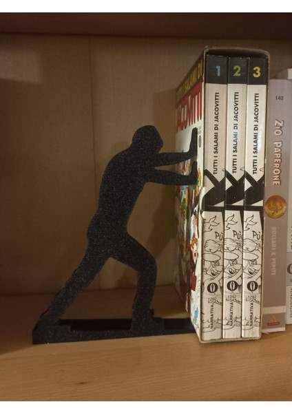 Tutan Adam Kitap Tutucu