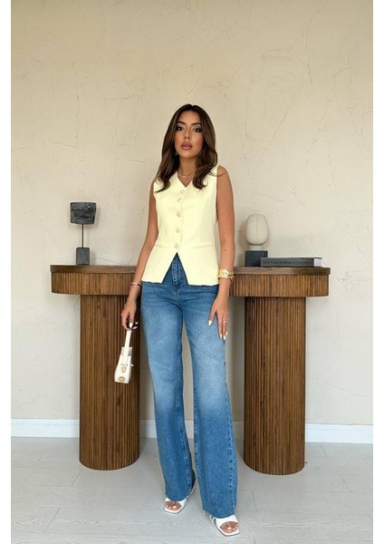 Sarı Belden Oturtma Detaylı Düğmeli Yelek fiyatları