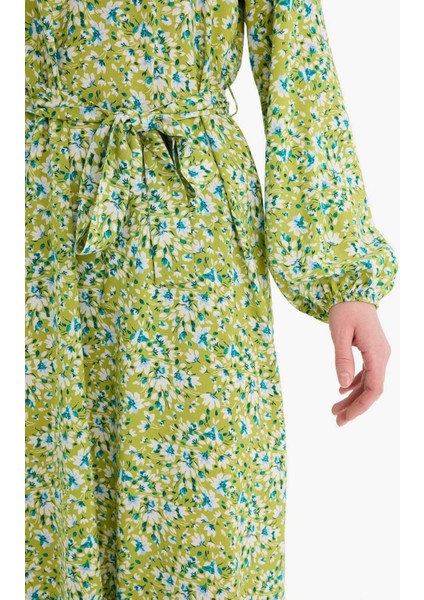Regular Fit Bisiklet Yaka Çiçek Desenli Kuşaklı Uzun Kollu Maxi Elbise D9835AX25SM fırsatları