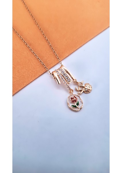 Mineli Çiçek Figürlü Sallantılı Çelik Kolye fırsatları