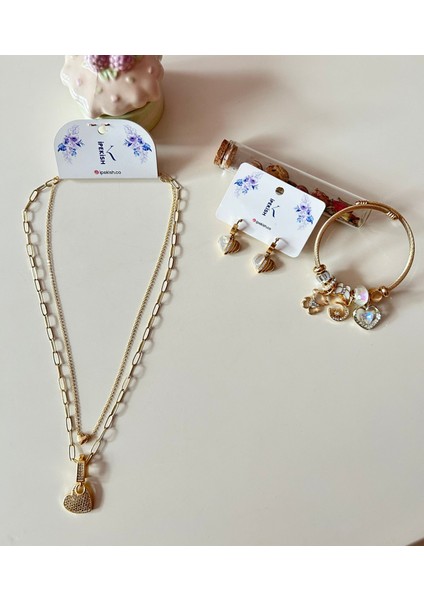 Gold Renk Paslanmaz Çelik Inci Boncuk Zincirli Kalp Sallantılı Kolye, Beyaz Zirkon Taşlı Kalp Sallantılı Çivi Küpe ve Kalp Detaylı Charm Bileklik 3’lü Set