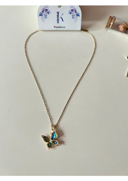 Lacivert Kelebek Figürlü Gold Renk Paslanmaz Çelik Kolye ve Zümrüt Zirkon Taşlı Sallantılı Gold Renk Çivi Kapamalı Çelik Küpe Seti fiyatları