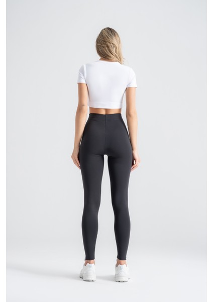 Kadın Toparlayıcı Tayt – Siyah Nervürlü Yüksek Bel Slim Fit, Dar Paça Sporcu Tayt