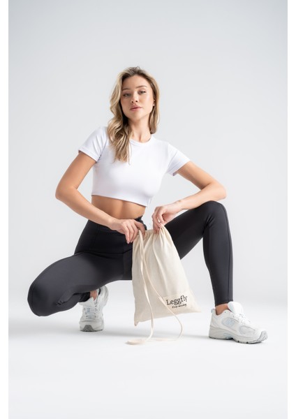 Kadın Toparlayıcı Tayt – Siyah Nervürlü Yüksek Bel Slim Fit, Dar Paça Sporcu Tayt