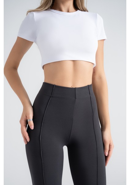 Kadın Toparlayıcı Tayt – Siyah Nervürlü Yüksek Bel Slim Fit, Dar Paça Sporcu Tayt