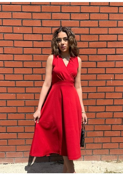 Kadın Ithal Krep Kumaş Kruvaze Yaka Eteği Kloş Kolsuz Mini Elbise fırsatları